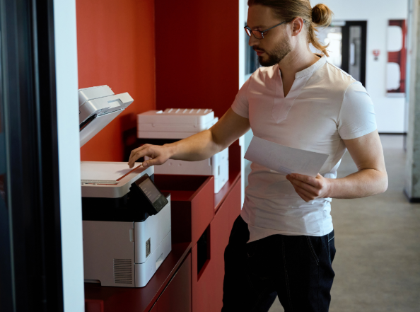 A person troubleshooting an Epson printer printing error.